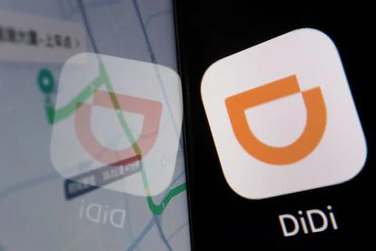 Pekín castiga a Didi Chuxing, el Uber chino, por uso indebido de los datos de sus usuarios 2 El logo de Didi Chuxing se refleja en un cristal.