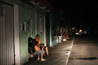 Aumentan las ejecuciones extrajudiciales en las zonas más pobres de Venezuela 2 Los vecinos hablan en la calle en la ciudad de Barquisimeto, Venezuela.